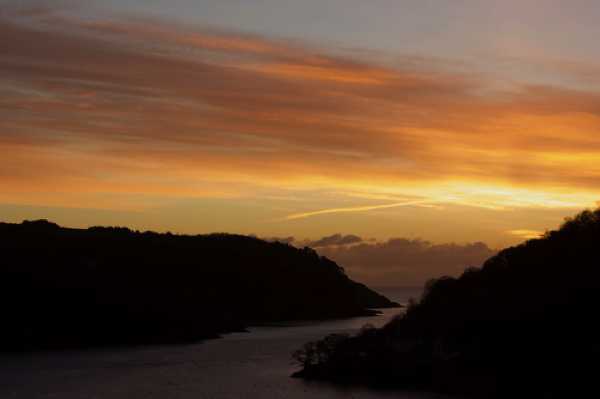 17 January 2021 - 07-58-34 
A particularly warm welcoming start to the day with this golden sunrise.
------------------------
Golden sunrise over Dartmouth river mouth